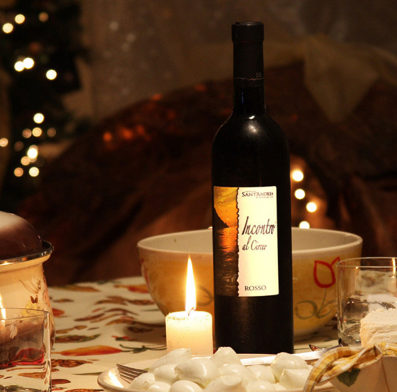 red wine by candlelight