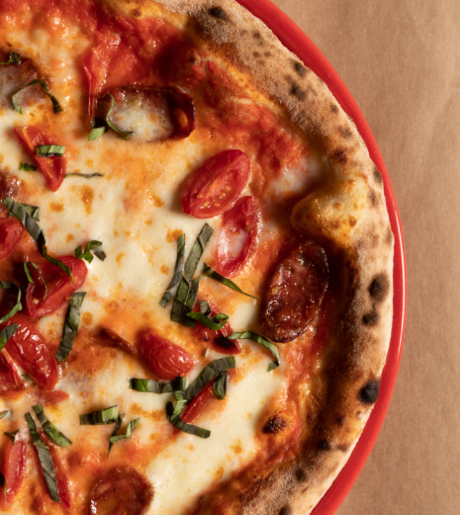 porzione appetitosa di pizza del Le Palme Village