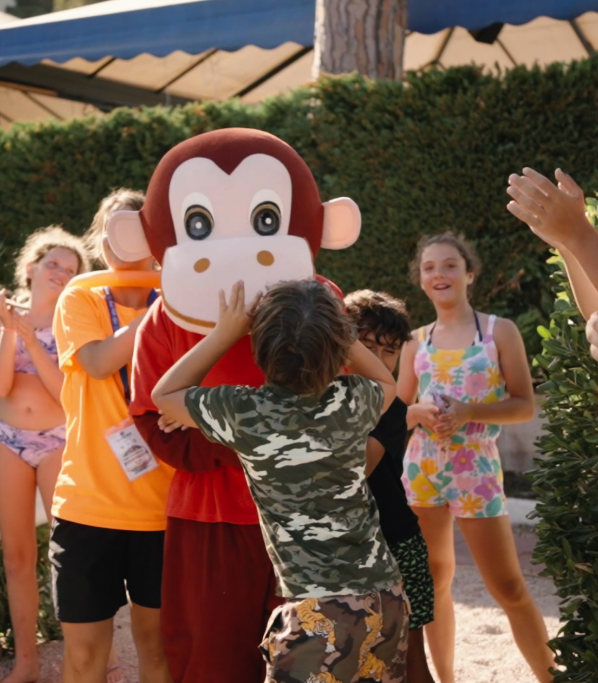 animator in mascot costume and children